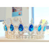 Large silver crown with blue gems