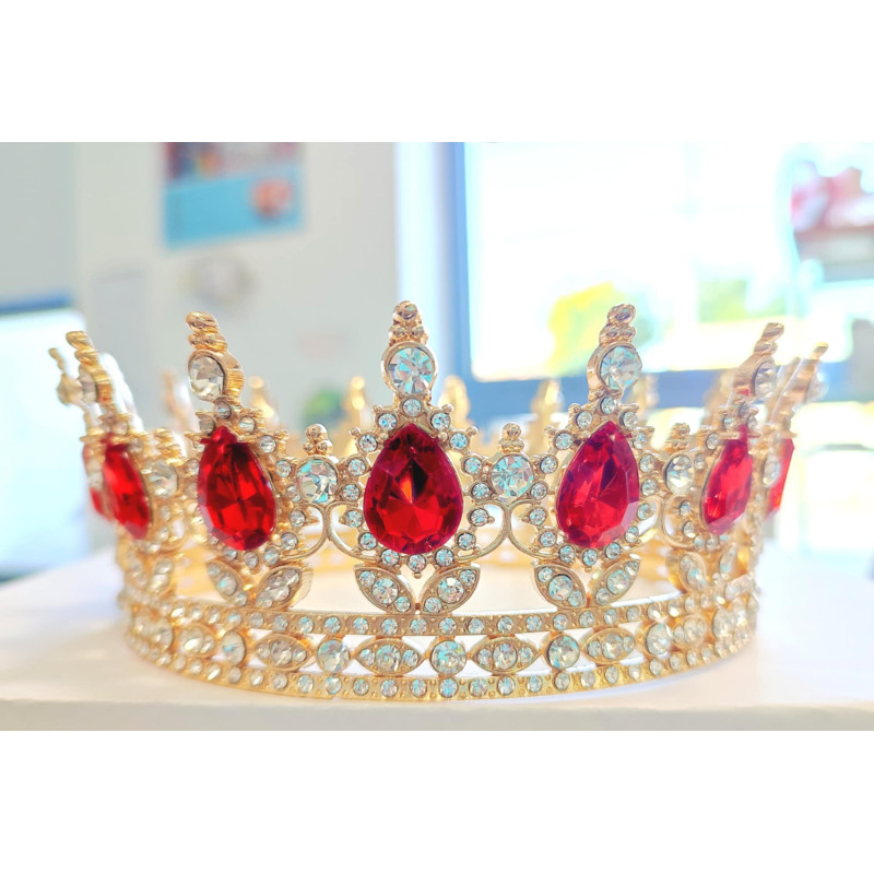 Large golden crown with red gems