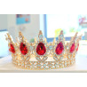 Large golden crown with red gems