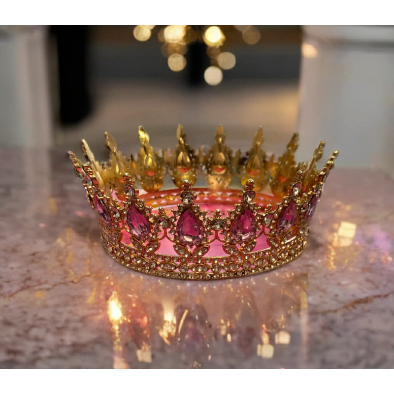 Large golden crown with pink gems