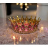 Large golden crown with pink gems