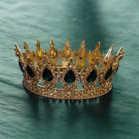Large golden crown with emerald green gems