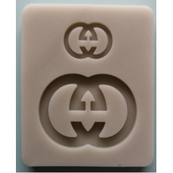 Szilikon Gucci logo