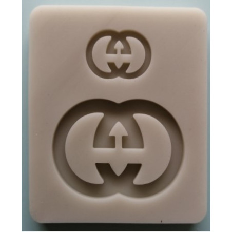 Szilikon Gucci logo