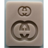 Szilikon Gucci logo