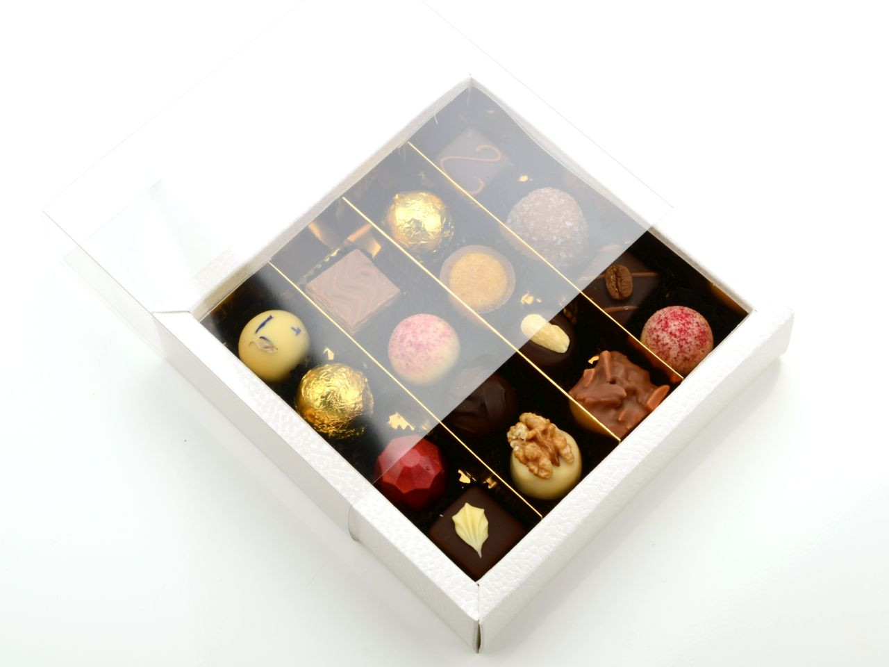 16 adagos trüffel / bonbon  mintás fehér átlátszó díszdoboz
